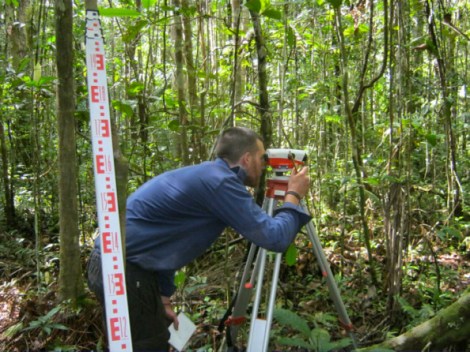 Surveying along a transect across the peatland.